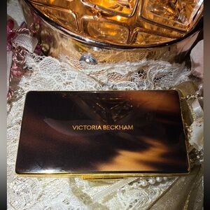 Victoria Beckham Brown and Gold Compact